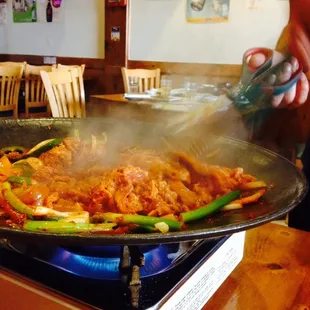 The only owner/server is in action cooking Jumuluk. Your patience is a must for the good delicious Jumuluk in mom and pop place.
