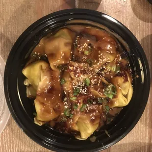 Wontons with sesame oil- also with some peanut sauce