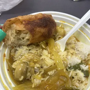 Shrimp egg roll and chicken curry the curry was delicious the egg roll noooo burnt