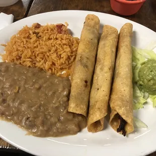#6 Special Flautas de Pollo con queso (with rice and beans).