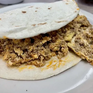 Egg and chorizo breakfast taco with flour tortilla