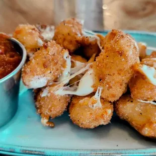 The best cheese curds ever. Both the marinara and the batter were deftly seasoned. The arrived quickly and were piping hot.