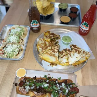 a variety of mexican food on a table