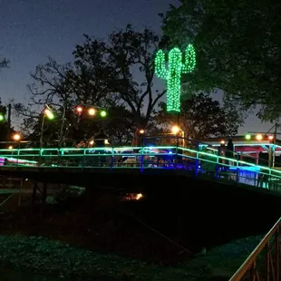 a bridge lit up at night