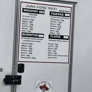 a menu on a food truck