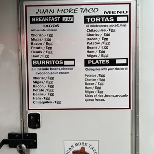 a menu on a food truck