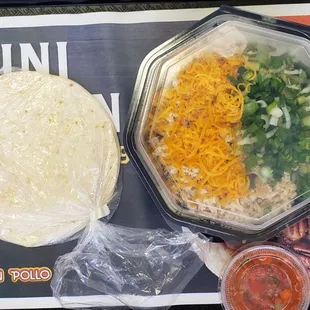 Juan bowl with flour tortilla and mild sauce