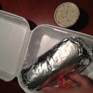 1lb chicken burrito with potato salad (hand for scale)