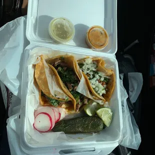 Carne Asada, Taco Barria, and a taco de chorizo.