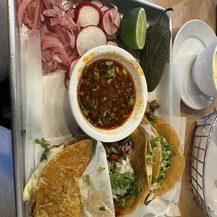 Taco Al Pastor (Marinated pork) Taco De Birria (Braised beef and cheese) Taco lingua