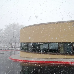 Exterior of the newly constructed addition (opened early 2016) at the Juan Tabo Library, on a snowy day.
