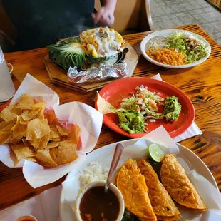 a table full of mexican food