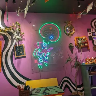 a neon sign in a room