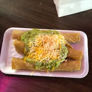 3 rolled tacos with cheese and guacamole.  Needed more cheese, if you ask me.