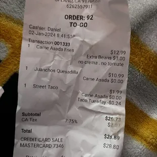 The receipt showing my &quot;asada&quot; fries