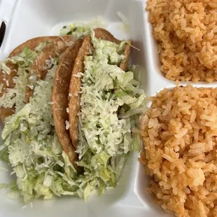 #50 crispy taco plate cones with rice and beans but my kid doesn't like beans so they gave him double rice