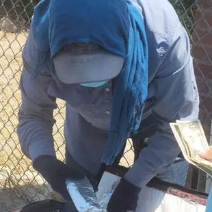 Juanita The Burrito Lady is working hard selling us her burritos in El Paso, Texas