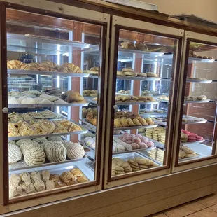 a display case full of pastries