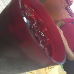 a woman sitting at a table in a restaurant