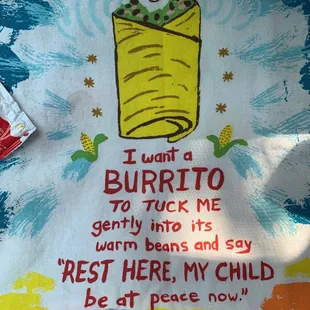 a blanket with a child in a burrito