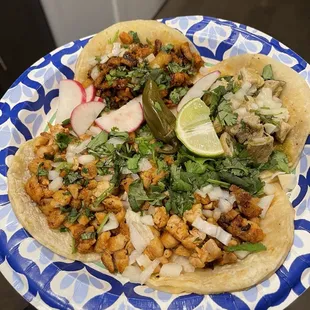Chicken tacos, al pastor, chile verde