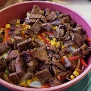 Mexican garden salad steak fajita $12.25- huge. Lots of steak! flavorful tender but salad basic (red onions, corn, black beans, bell pepper)