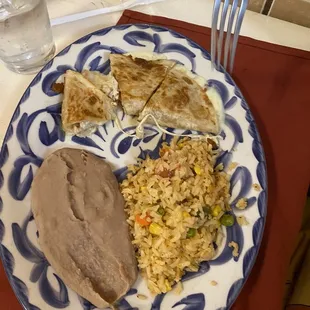 Kids Chicken Quesadilla with Mexican rice and refried beans.