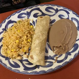 Kids taco al carbon with refried beans and Mexican rice.