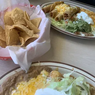 Chips, chicken Tostadas, rice and beans