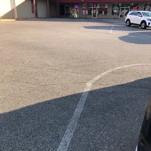 Located in shopping plaza near theater
