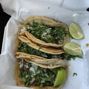 three tacoss in a styrofoam container