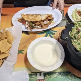 Chicken quesadilla (fajita style)  Chunky guacamole Cheese dip