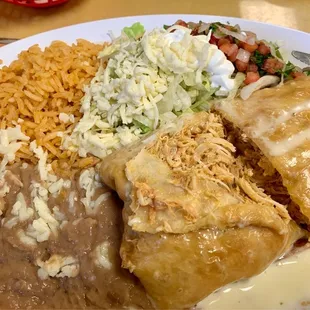 Chicken chimichanga, beans, &amp; rice with pico de galo, lettuce, &amp; sour cream