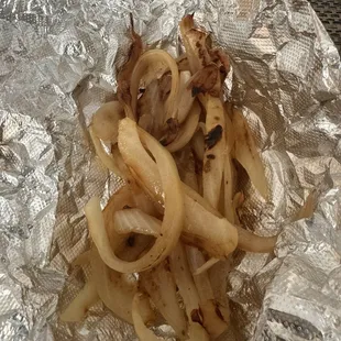 Side order of grilled onions. There was more here than is pictured. I threw them inside my Mulitas. Delicious!