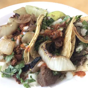 Carnitas, asada, y chorizo tacos