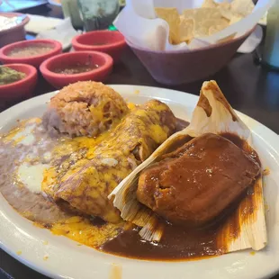 Chile Colorado enchilada and pork tamale combo.