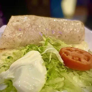 a burrito and salad