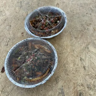 Two asadas fries with out napkins neither fork and knife  food may be good but service terrible