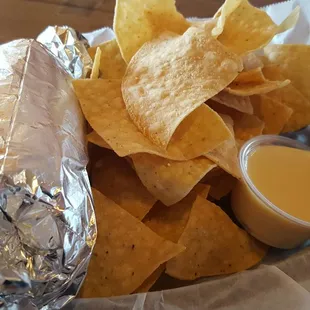 Grande burrito. Skip the queso though.  It&apos;s weak AF.