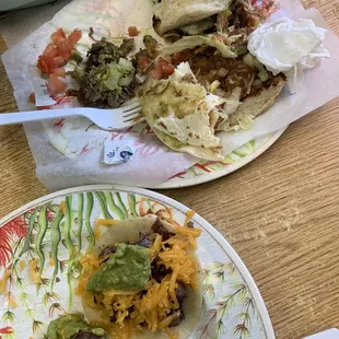 Beef mini tacos, barbacoa taco and carne guisada torta