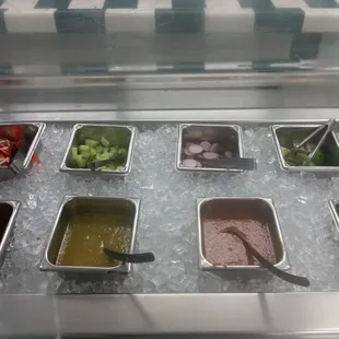 Self Serve Salsa Bar!! They even have cucumbers and radishes.