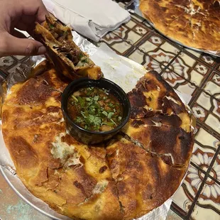 Quesadilla with birria meat and consume/soup. #quesabirria