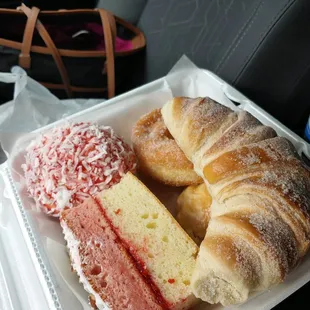 a croissant sandwich and a croissant cake