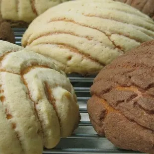 This is a sweet bread called &quot;concha&quot; which means shell in Spanish. It resembles a shell of a clam hence the name.