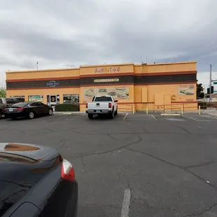 two cars parked in a parking lot