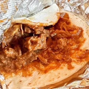 a burrito wrapped in foil