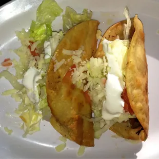 Beef and chicken dorado tacos