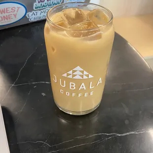 Iced vanilla latte with oat milk