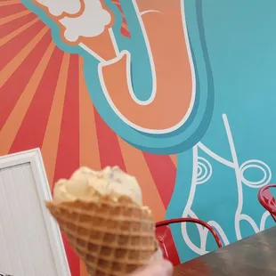 a woman eating an ice cream cone