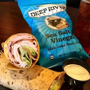 Our Club Wrap with one of our five homemade sauces!